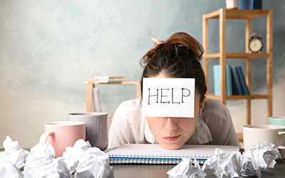 What are your blind spots? Person with help sign on forehead.
